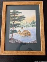Framed watercolor showing full artwork and frame