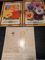 All three signs laid out: two Burt's Seed signs above, Chesapeake & Ohio sign below