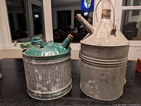 Front view of both galvanized fuel cans