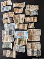 All banknotes laid out to show variety and condition