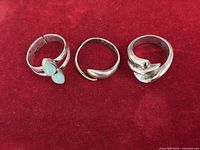 All three rings on red background