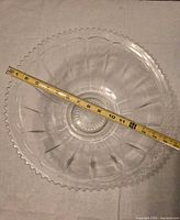 Top view showing full bowl and measuring tape confirming diameter