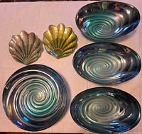 Top view of all six glass pieces displaying colors and patterns