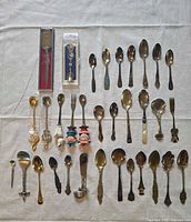 overview of entire lot laid on cloth showing quantity and variety