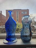 front view of both vases on windowsill