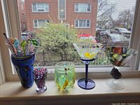 Group shot of all five glasses on windowsill