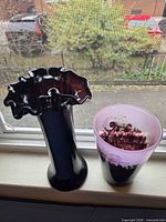 Front view of both vases on windowsill