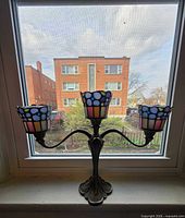 Front view of entire 3-light stained glass candle holder
