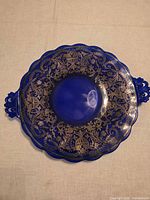 Top view of cobalt blue platter showing overall design and handles