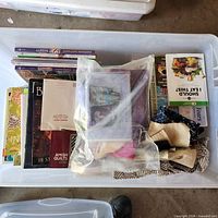 Overall view of tote with books and bag of fabric
