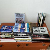 Overall view of three stacks plus vertical display showing variety of titles and subjects