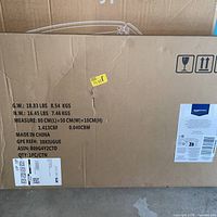 Shipping box showing crate outline diagram and handling symbols