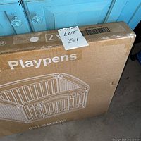 Front view of sealed box displaying product image and model number