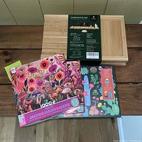 Overview of bamboo breakfast tray package and two puzzle boxes