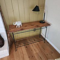 Console table front perspective showing top, frame and shelf