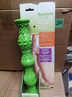 Front view of packaged green dual foot roller