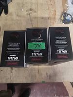 Three Premium Tone TN760 cartridge boxes top view
