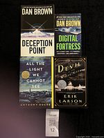 Group image showing four paperback novels