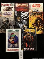 Front covers of all eight comics