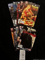 Ten comic books fanned out