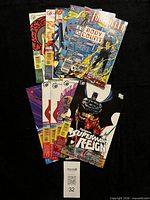 All ten comics fanned out