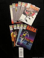 All ten Raika comics fanned out