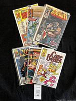 All six bagged comic books fanned out