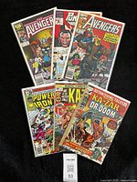 All six bagged Marvel comic books fanned out