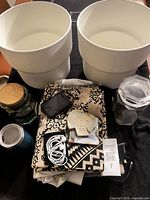 overview showing planters, charger, fabrics, jars, tumbler, earphones, ceramic hearts