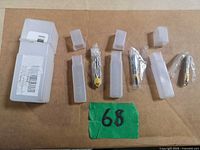 All three router bits in plastic wrap with individual clear cases
