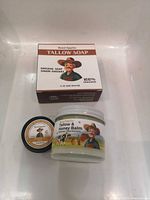 Boxed tallow soap, balm jar, lip balm tin grouped