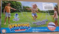 Front of retail box showing product name, brand, age rating 3+, image of children using spraying jump rope, note of 12 water jets