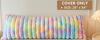 Front view of pastel rainbow faux fur lumbar pillow cover displayed on a couch, size noted