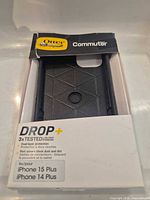 Front view of boxed OtterBox Commuter Drop+ case