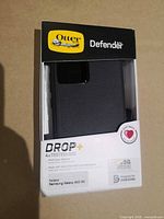 Front of unopened OtterBox Defender Series case package