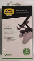 Front of sealed OtterBox Mobile Gaming Clip box