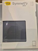 Front of sealed OtterBox Symmetry Series 360 packaging showing gray case
