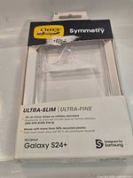 Front view of packaged OtterBox Symmetry Series clear case