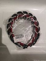 Three headbands sealed in plastic packaging