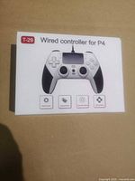 Front of box showing T-29 wired controller for P4