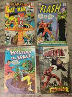 Front covers of all four comics