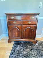 Full front view of American Drew server showing drawers, doors, finish