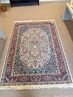 Full view of Persian-style floral area rug