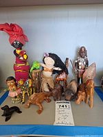 Group shot of all figures and animals on shelf