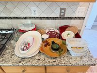 Overview of all serving dishes, storage containers and accessories on countertop