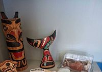Totem pole, whale tail, boxed rocks visible