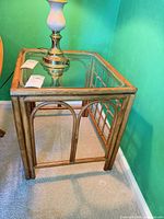 Full view of rattan square table with glass top