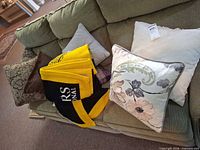 Throws and pillows laid on sofa