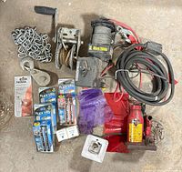 Overall lot including electric winch, bottle jack, chain pulley, LED strip packs, MR11 bulb, spare chain
