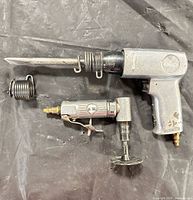 Air hammer with tapered bit, die grinder with cutoff wheel, loose spring retainer